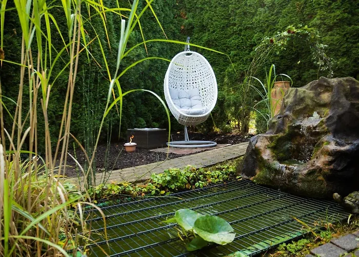 Gartenfewo Mit 2 Schlafzimmern Und 2 Wlan Homeofficeplaetzen Waschtrockner Sowie Smart-tv Und Kostenlose Parkplaetze アパート